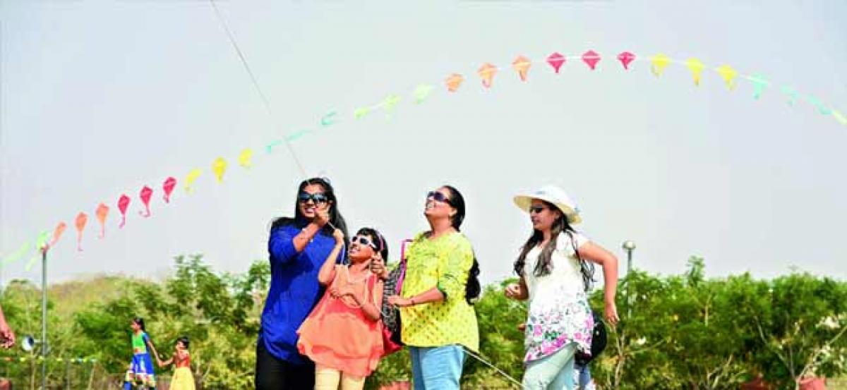 Minister releases poster for Kite & Sweet Festivals