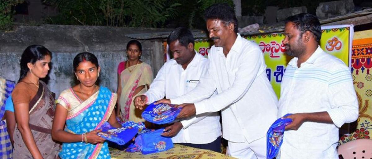Sarees distributed to 40 Kolatam women in Sultanabad