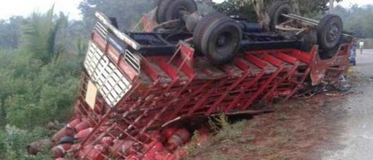 Close shave: Lorry carrying gas cylinders overturns in Jadcherla