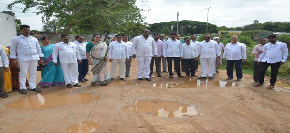 Lakshmi Prasanna assures slab on open drain