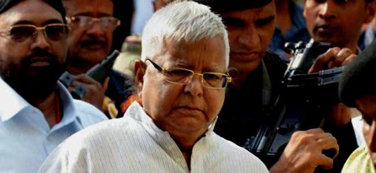 Delhi court summons Lalu Prasad, wife, son Tejaswi in IRCTC scam