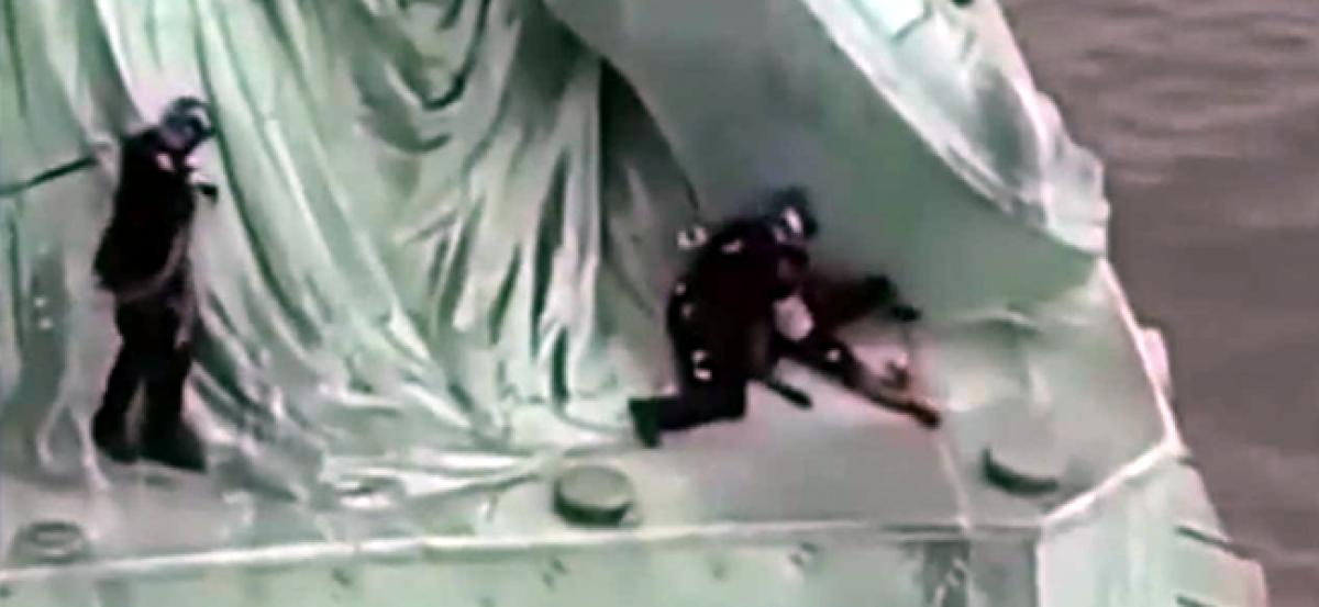 Statue of Liberty climber to be arraigned after immigration protest