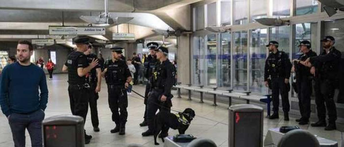 Teen held in London tube train attack