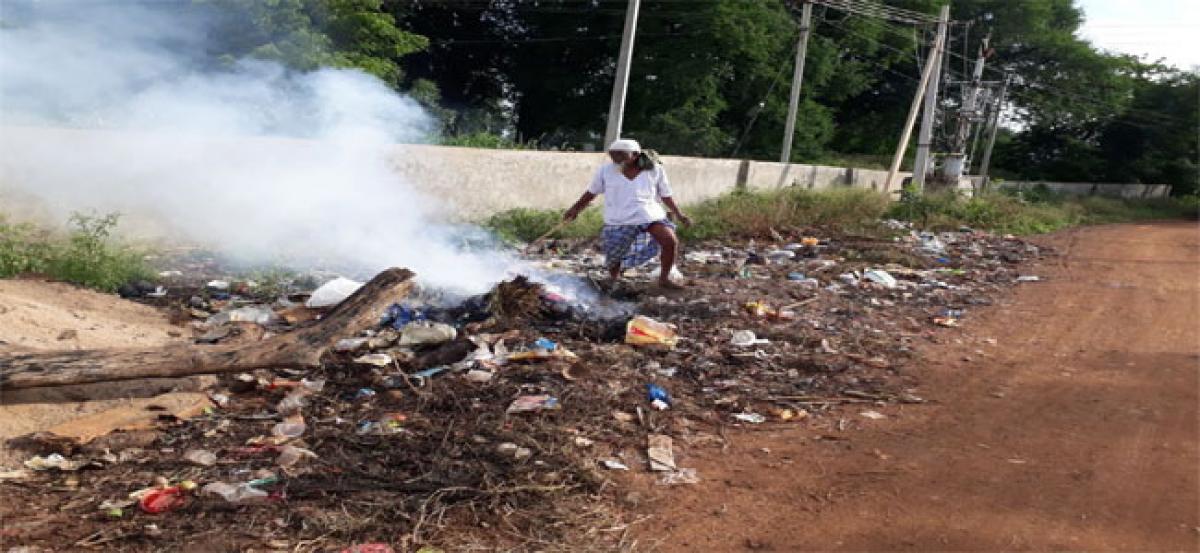 75-year-old man clears garbage