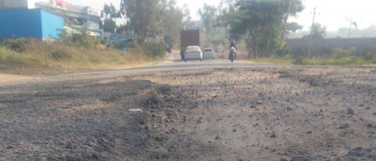 Pothole-ridden Palamuru roads cry for officials attention