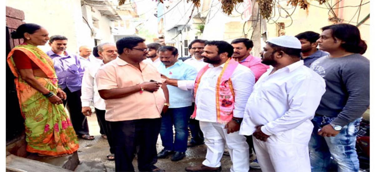 Manne Govardhan Reddy interacts with Harigate locals