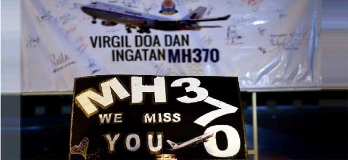 Malaysia says private search for MH370 to end next week