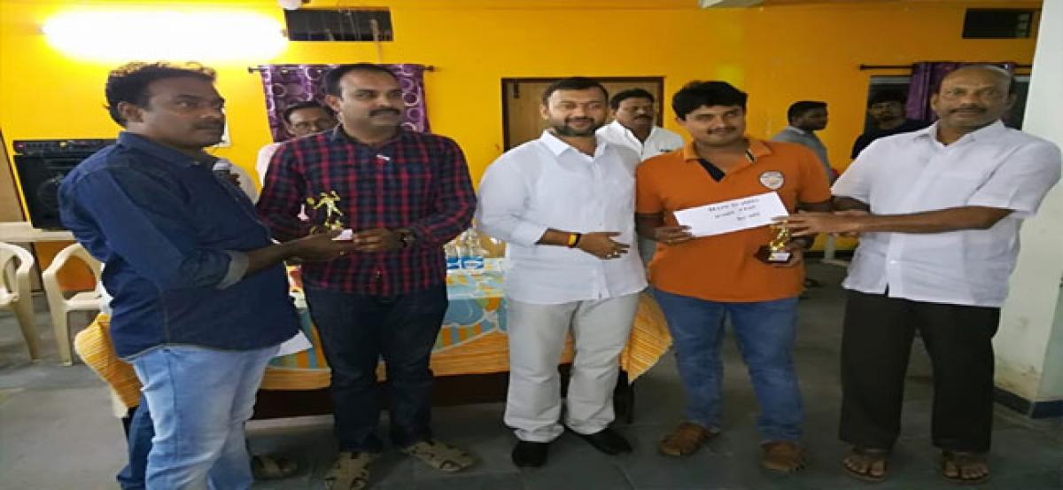 Medchal Olympic Association Chairman presents awards to Badminton players