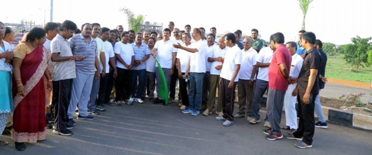 MP flags off 2 K Walk for journalists