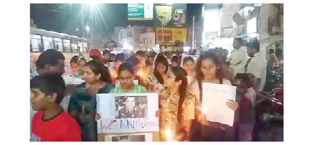 Girls hostel students hold candle light rally