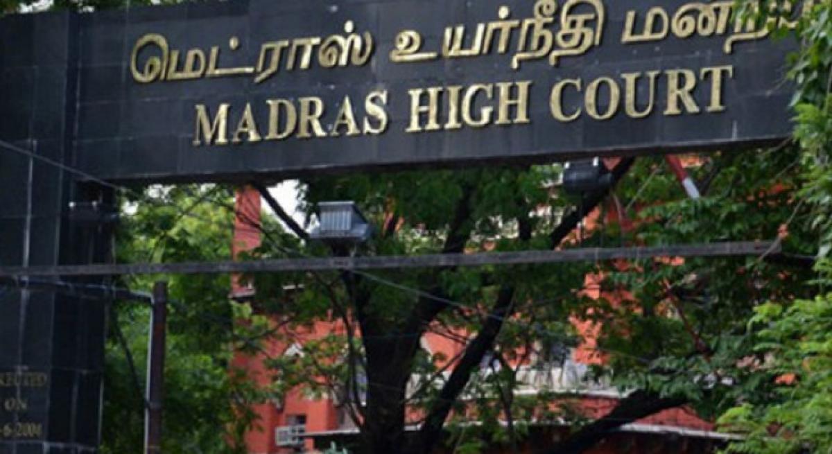 Karunanidhi to be laid to rest at Marina beach: Madras HC