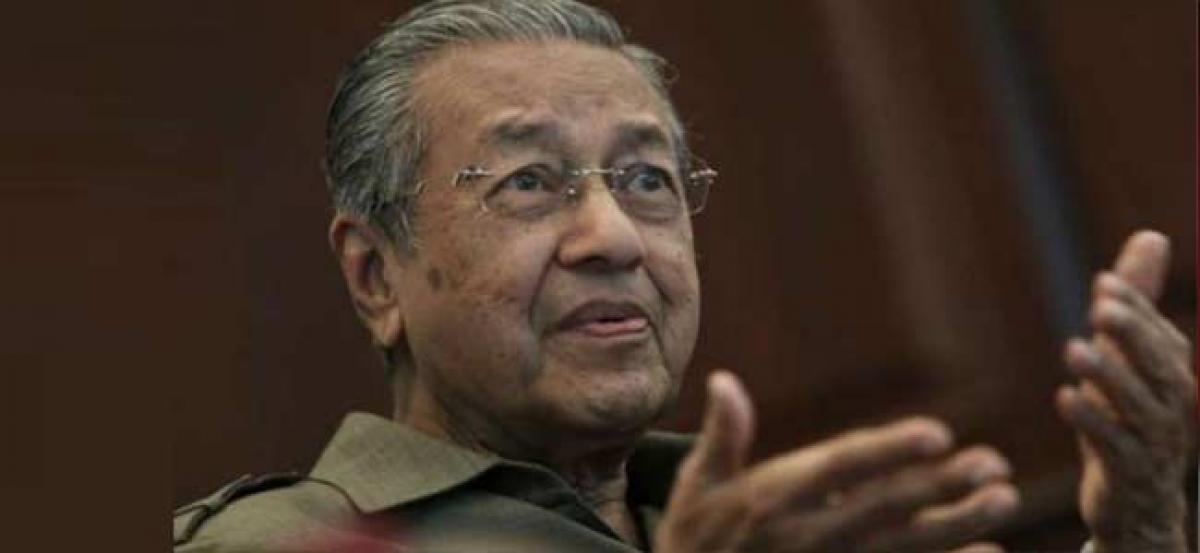 Election over, new Malaysia PM Mahathir Mohamad gets down to business