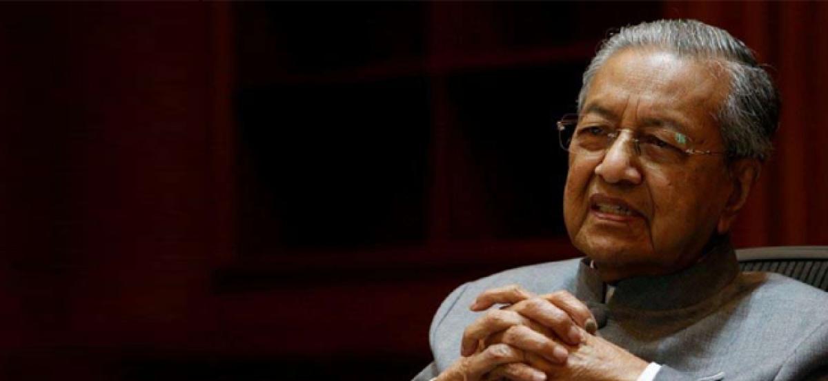 Malaysia arrests Najib ex-aide in 1MDB probe: media