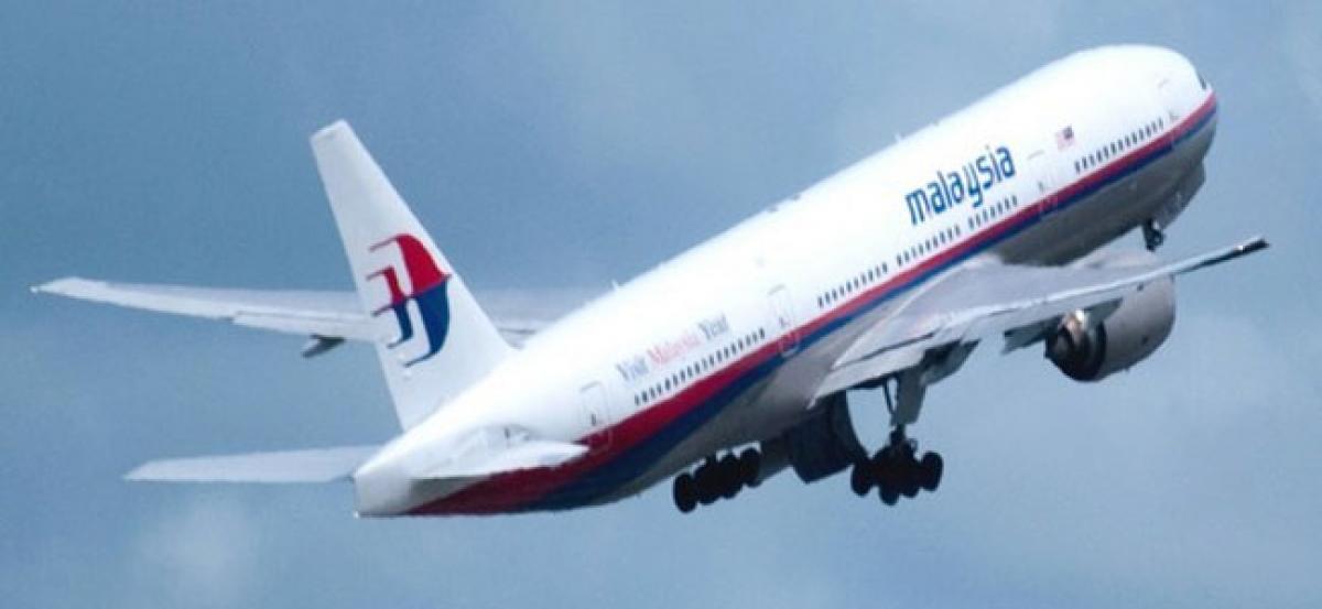 Malaysia aviation chief resigns over MH370 report