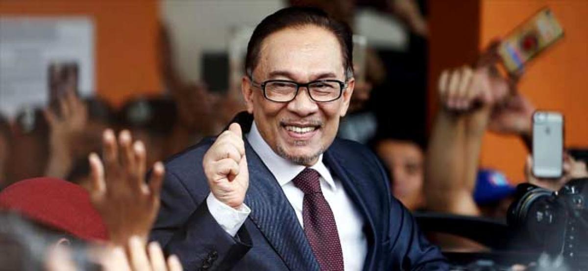 Malaysias Anwar Ibrahim walks free, says will not join cabinet any time soon