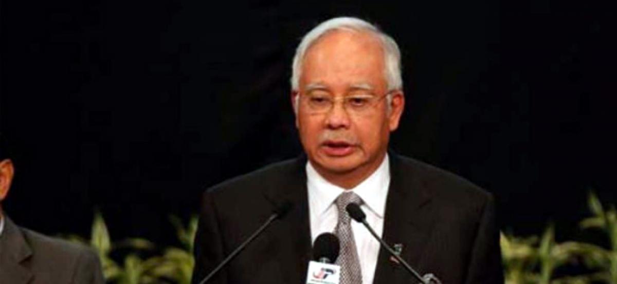 Najib Razaks Malaysia govt used funds from central bank land deal to pay 1MDB dues, say sources