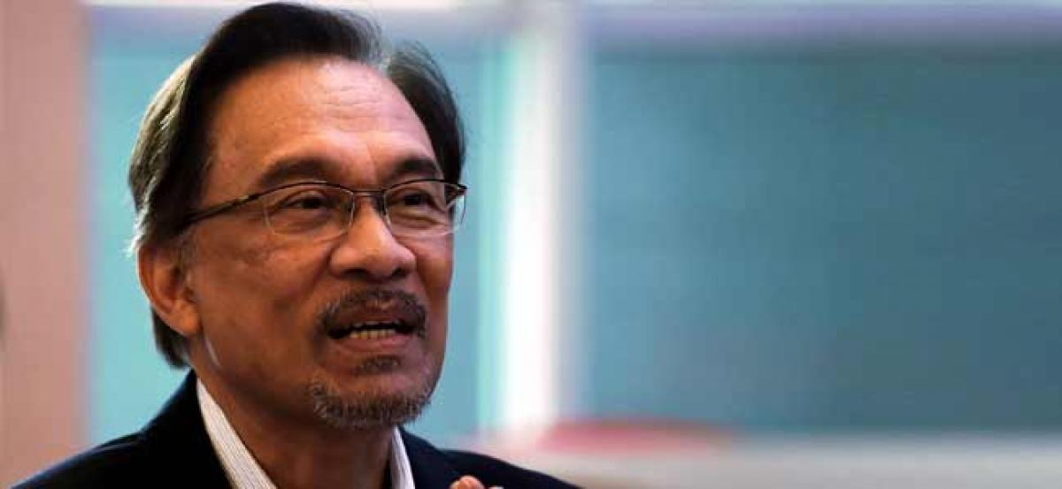 Voting opens in Malaysia by-election for PM-in-waiting Anwar