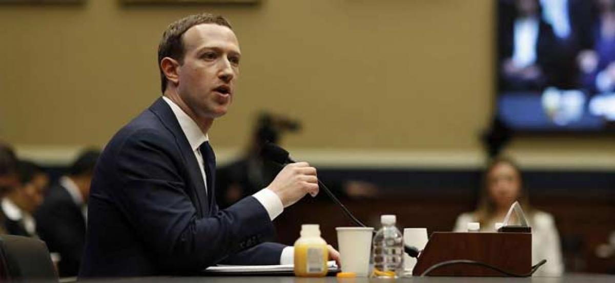 Facebooks Zuckerberg says his own data was shared by Cambridge Analytica, unscathed by congressional grilling