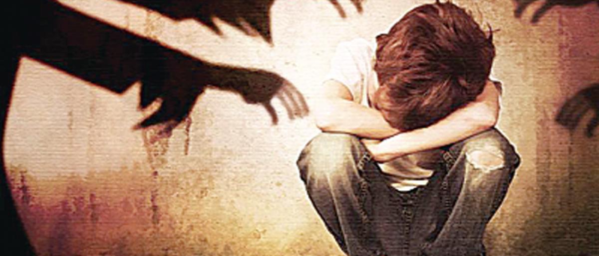 Man booked for sexually abusing minor daughters