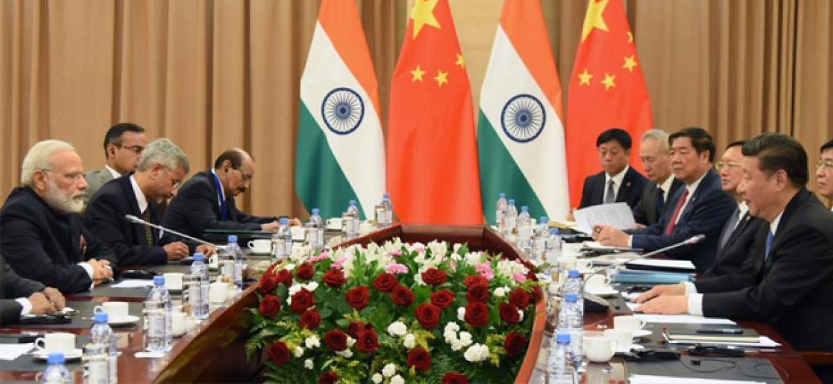 Modi, Xi meet, hold conversation at BRICS leaders meeting