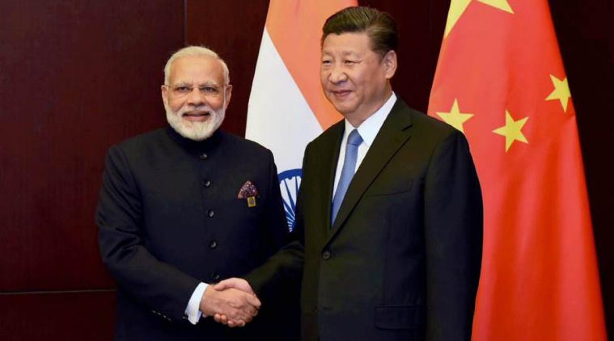 BRICS summit kicks off; Xi, Modi display bonhomie