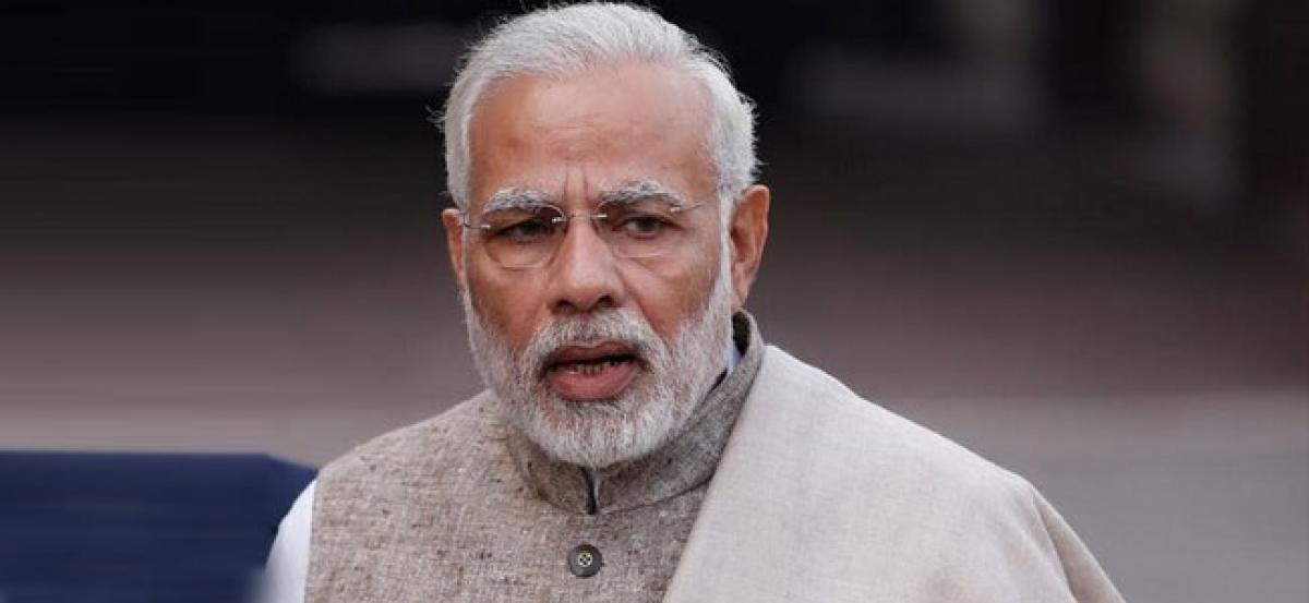 PM Modi discusses flood situation with Kerala CM