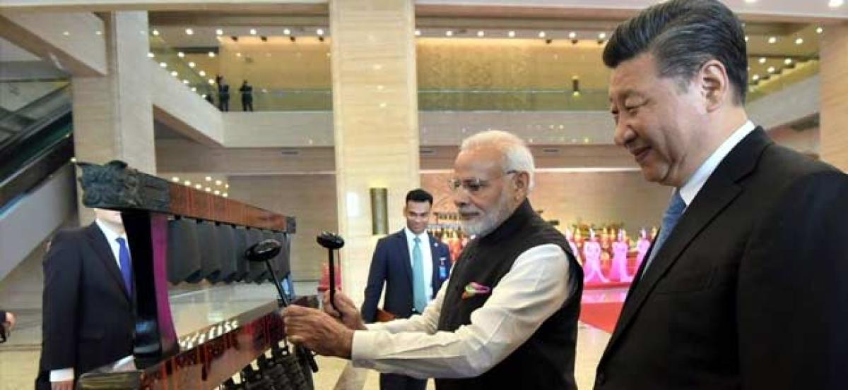 Modi-Xi bonhomie on display at Wuhan, PM pitches for next informal summit in India