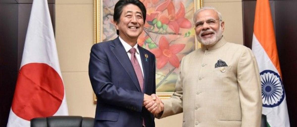 Narendra Modi and Japans Abe draw closer as Tokyo woos Beijing