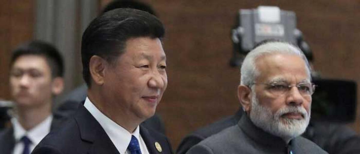 Modi, Xi vow to build trust