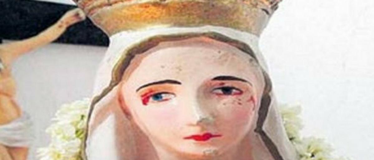 Blood oozes from Mother Mary statue?