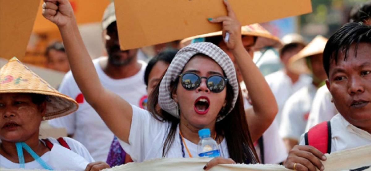 Myanmar anti-war protesters call on Suu Kyi to act against violent police