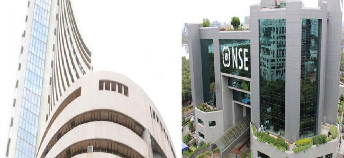 Equities close marginally lower; Nifty50 at fresh intra-day high (Second Lead)