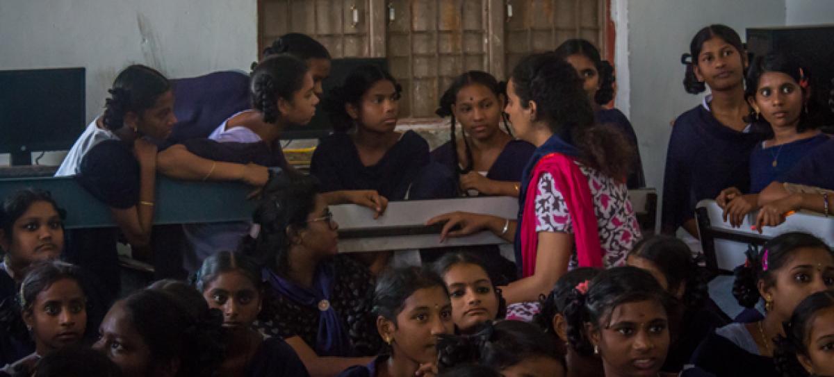NSS Sparsha educating schoolgirls on hygiene