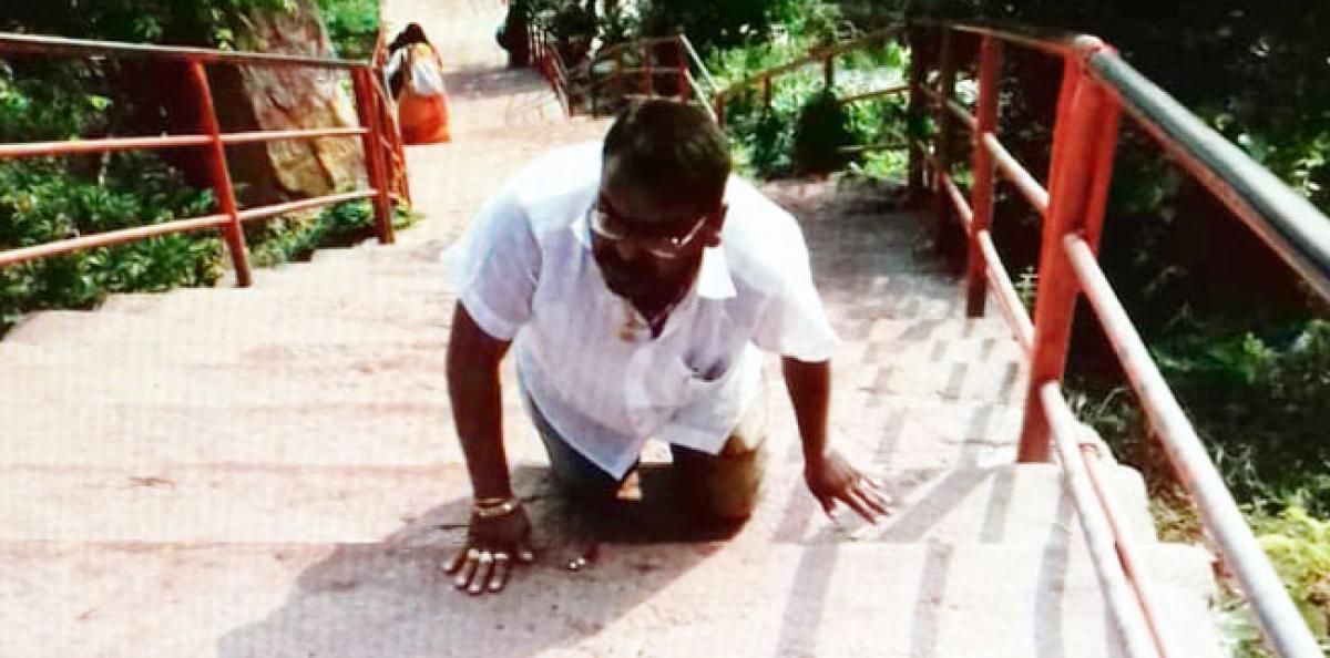 Congress worker climbs hillock on knees for party’s win