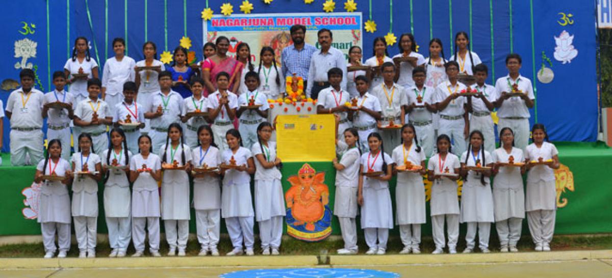 Students of Nagarjuna make clay Ganesh idols