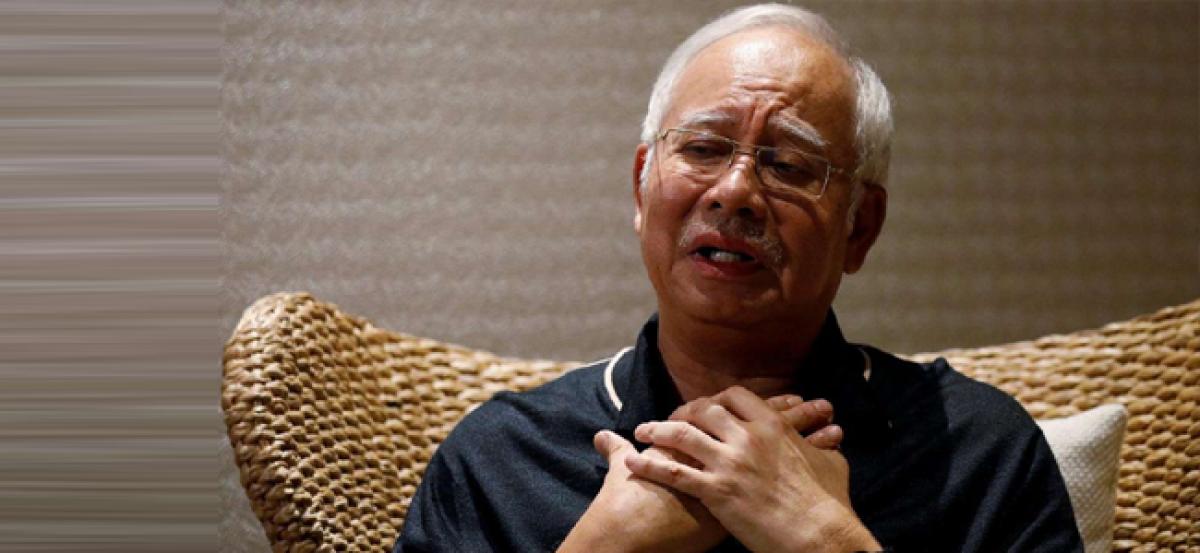 Malaysias 1MDB taskforce freezes bank accounts of former PM Najib Razaks party