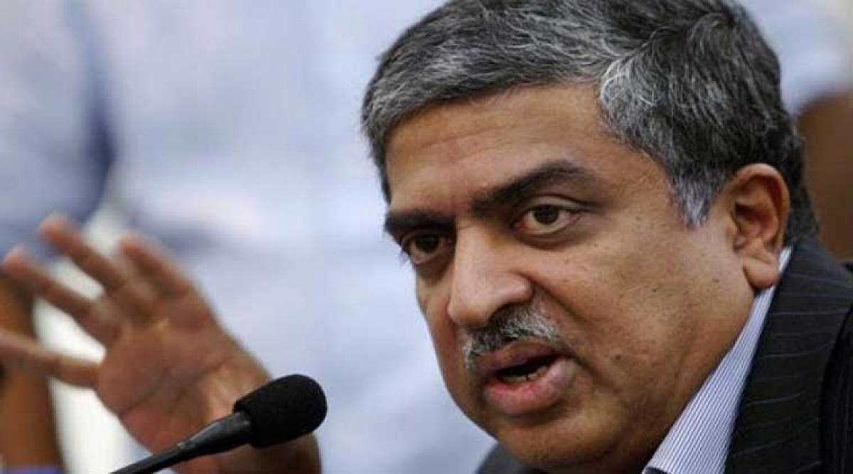 Will be with Infosys as long required: Nilekani