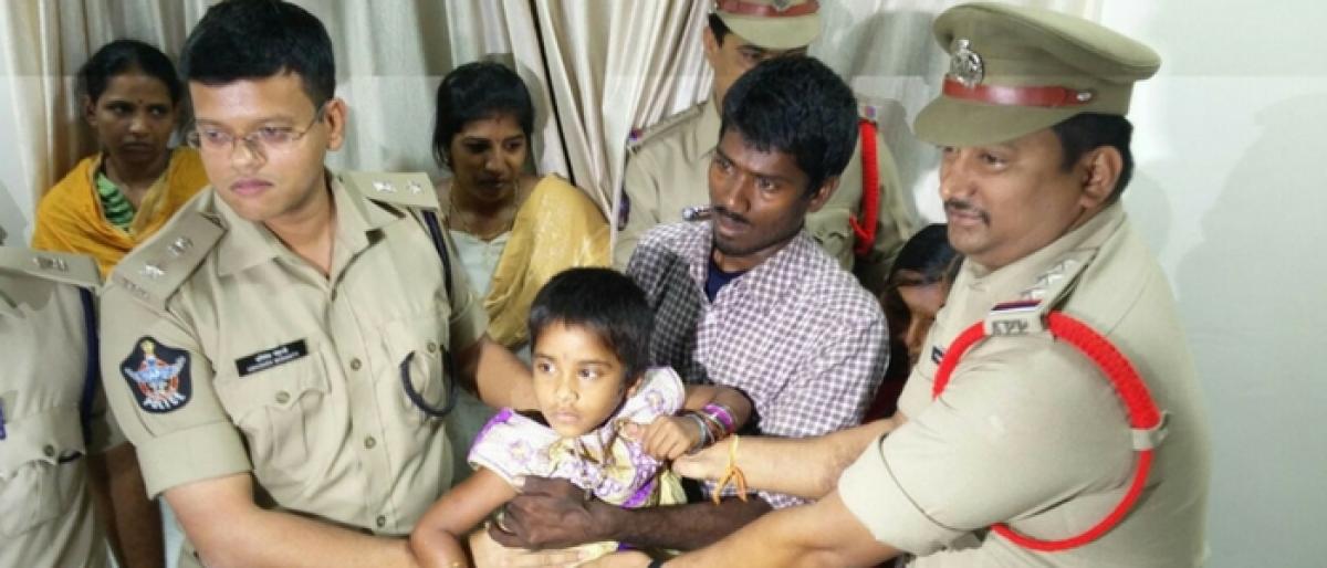 Abducted child Nandini reunited with parents