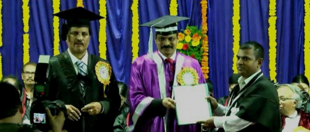 Nunna ZP high school alumni Prasad gets doctorate from Andhra University