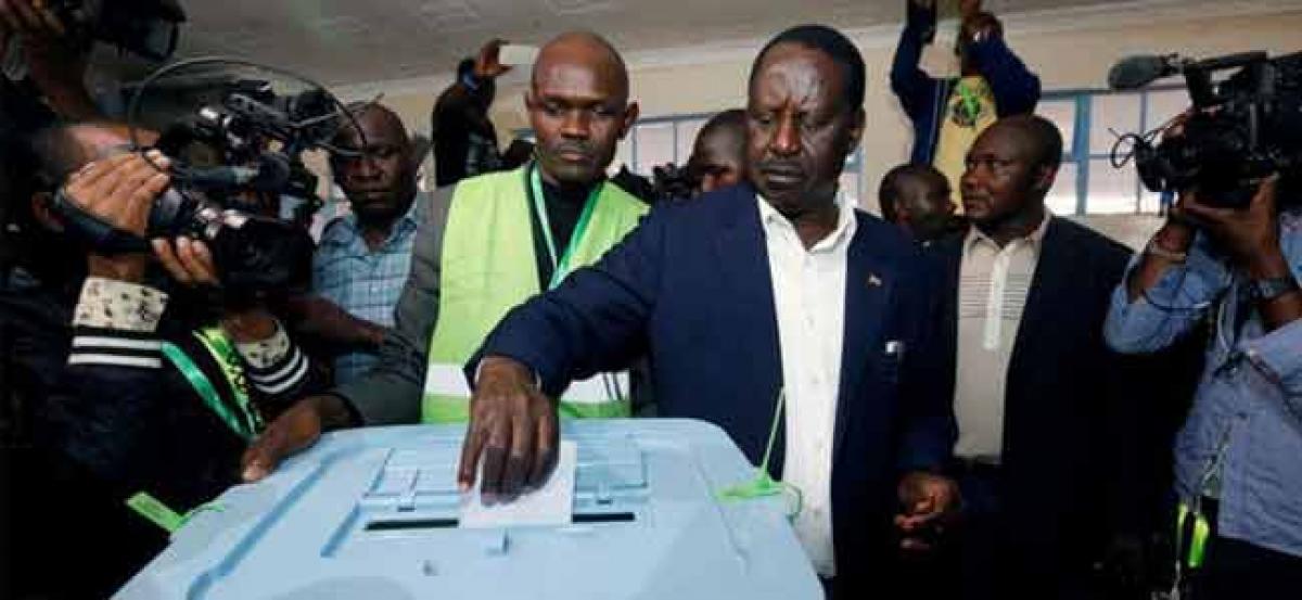 Odinga says Kenya election hacked to show lead for president Kenyatta