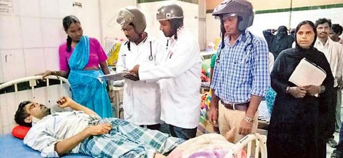 Osmania Hospital doctors treat patients by wearing helmets