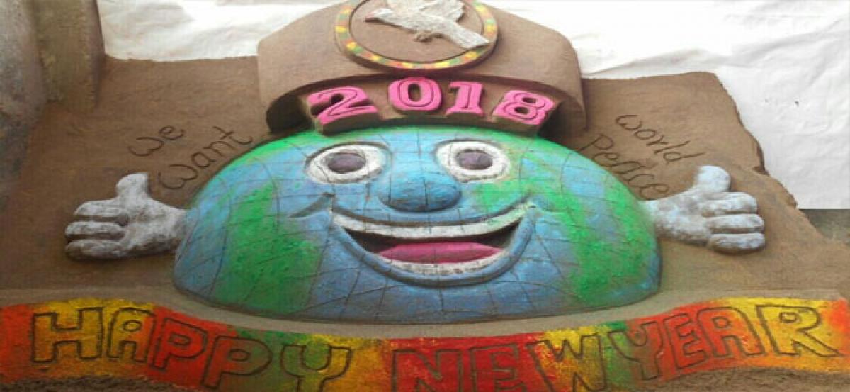 New Year sand sculpture made for world peace