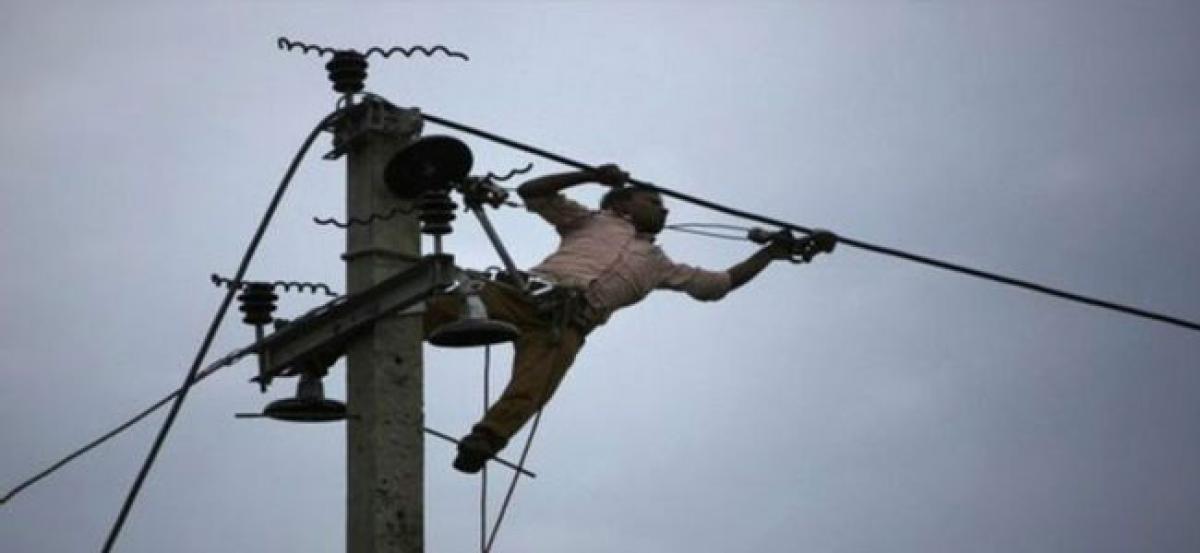 Electric pole workers safety up in the air