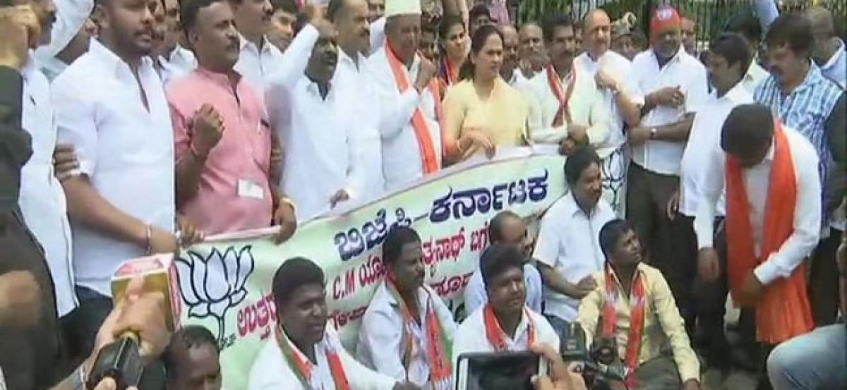 BJP protests as Ktaka Cong chief says Yogi unfit to be CM