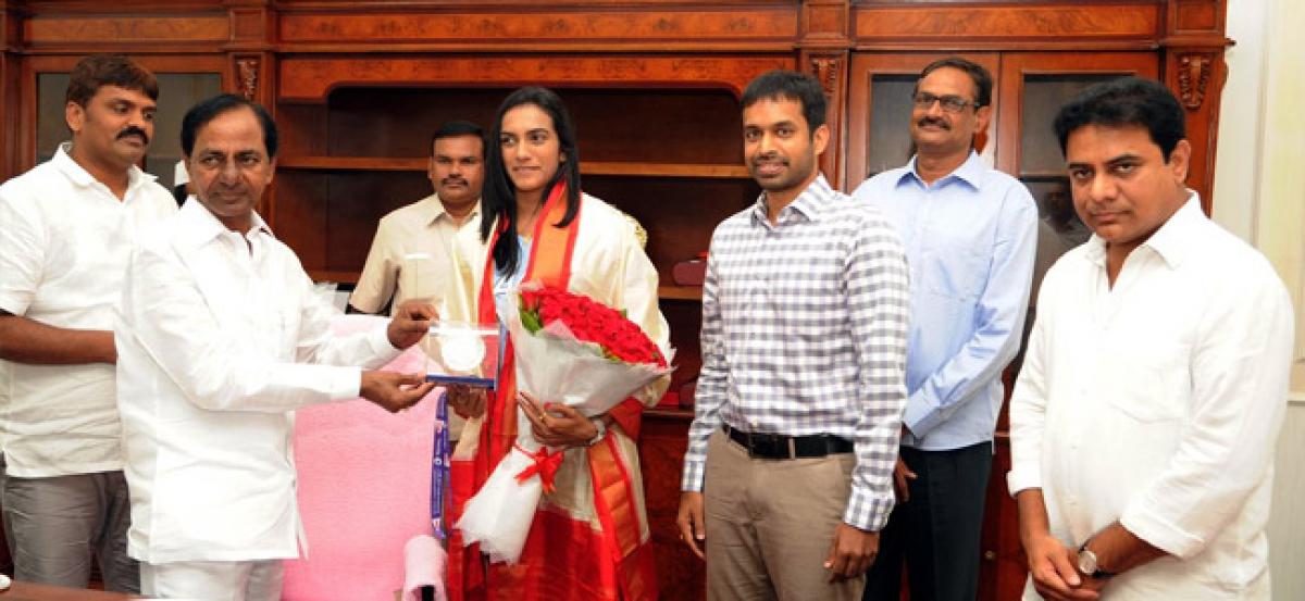 CM felicitates Sindhu for winning Silver Medal