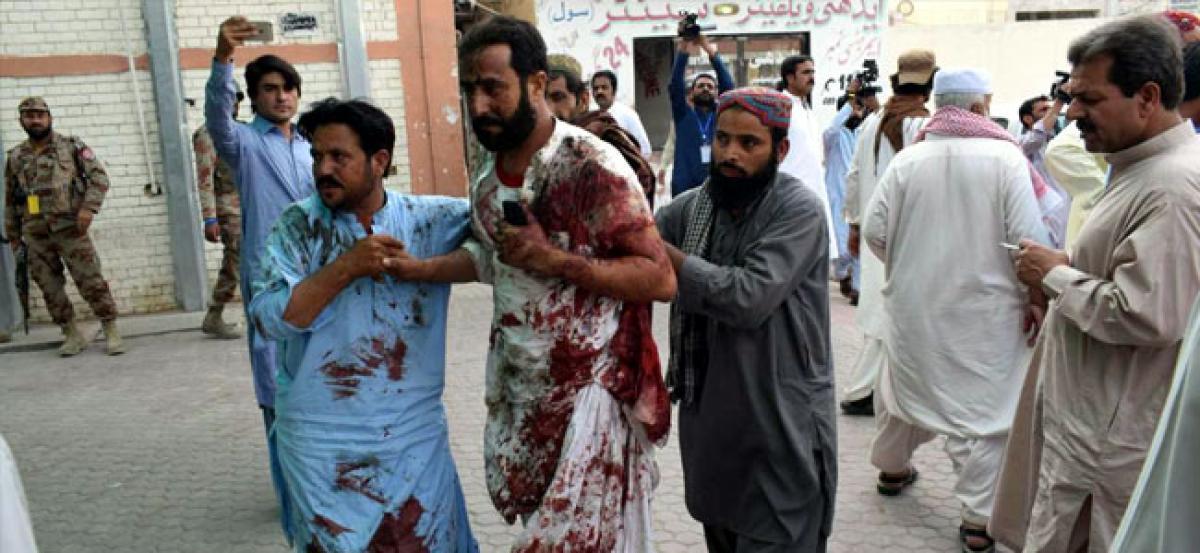 Suicide bomber kills 128 in attack on Pakistani election rally, ISIS claims responsibility