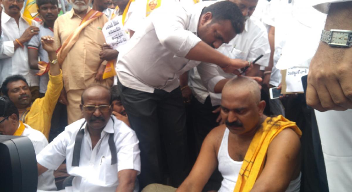 TDP MLA shaves his head over injustice to AP