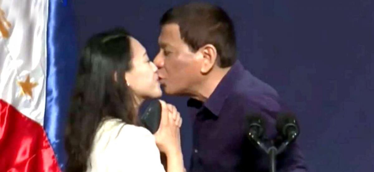 Caught in row over a kiss, Philippine President Duterte says will quit if enough women protest