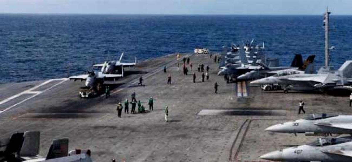 US Navy aircraft with 11 aboard crashes in Philippine Sea