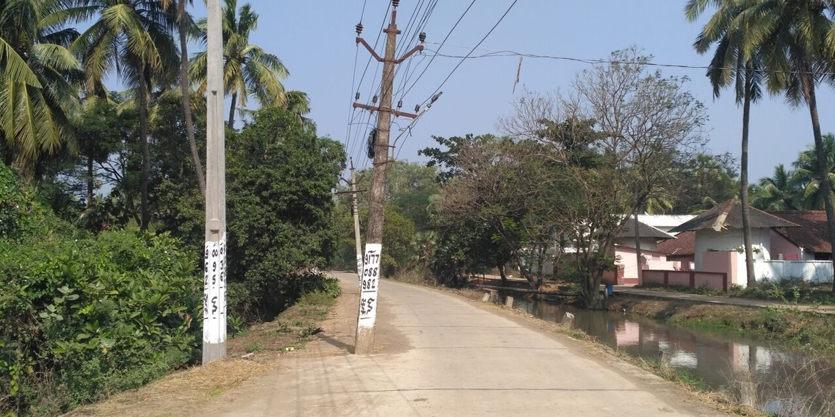 Electricity poles eat into road